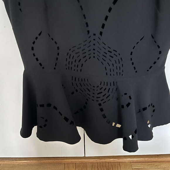 Elegant Black Peplum Top - Picture 2 of 5